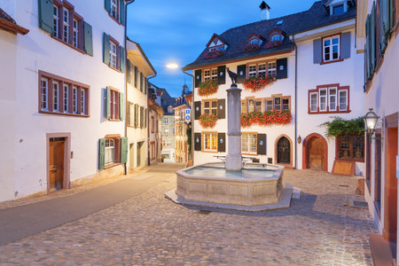 Basel, Switzerland fountain in the Old Town at blue hour.の写真素材