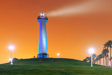 Long Beach, California, USA Harbor Lighthouse at dawn with dramatic fog.の写真素材