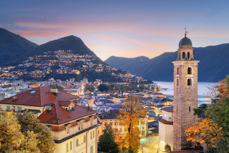 Lugano, Switzerland at dawn in autumn on Lake Lugano.の写真素材