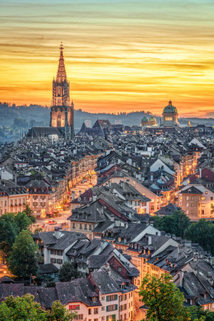 Bern, Switzerland old town skyline at dusk.