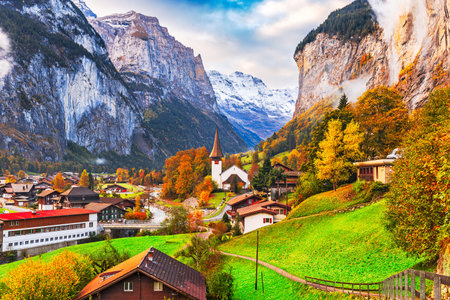 Lauterbrunnen, Switzerland beautiful morning during autumn season.の写真素材