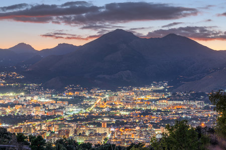 Palermo, Italy cityscape towards the mountains at dusk.の写真素材