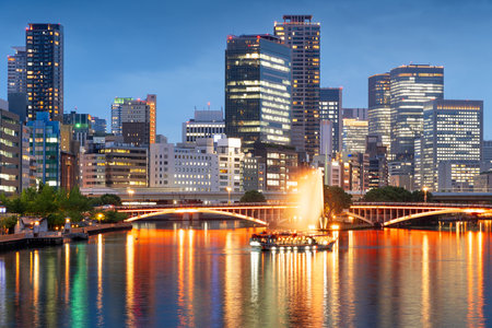 Osaka, Japan cityscape on the Okawa River at twilight.の写真素材