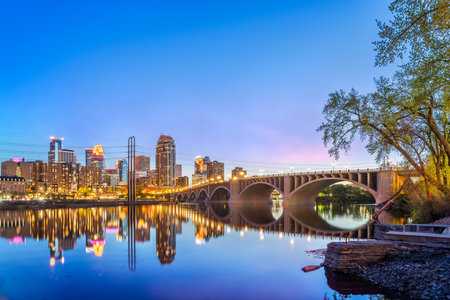 Minneapolis, Minnesota, USA downtown city skyline on the Mississippi at blue hour.の写真素材