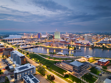 Cedar Rapids, Iowa, USA cityscape on the Cedar River at dusk.の写真素材