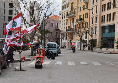 Beirut / Lebanon: January 12th 2020: Cityscape of Martyrs'square, Beirut Downtown, Lebanon with lebanese flag sailer for the occasion of the protest against corruptionのeditorial素材