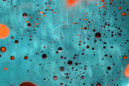 Abstract background with water drops in blue, orange and red colors.