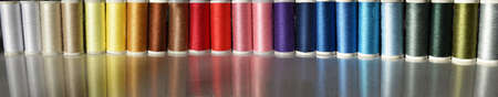 art banner with spools of colored threads, for colorful texture background, haberdashery, threads...