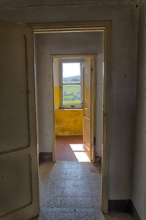 View of series of doors in abandoned farmの写真素材