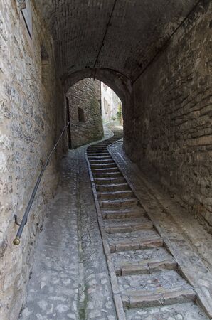 View of winding staircase in a typical italian townの写真素材