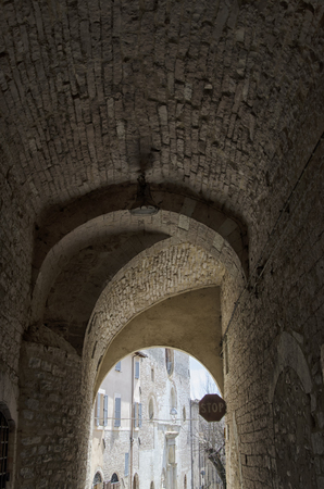 Series of arch opposed in a italian villageの写真素材