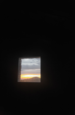 Sunup view from a window in a park