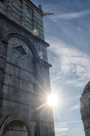 Baptistery and the cathedral of Pisa at sunsetの写真素材