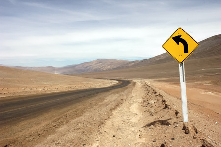 Road sign in the desert of Atacamaの写真素材