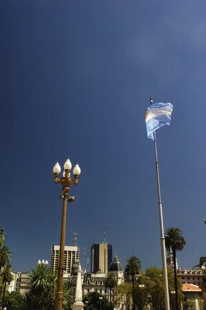Argentine flag flying in the Plaza de Mayoの写真素材