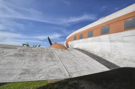 View of DC-3 in a aircraft boneyard