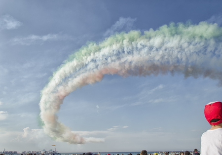 The trail of colored smoke left by the Frecce Tricoloriの写真素材