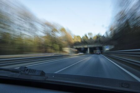Driving too fast on a highway in Italyの写真素材