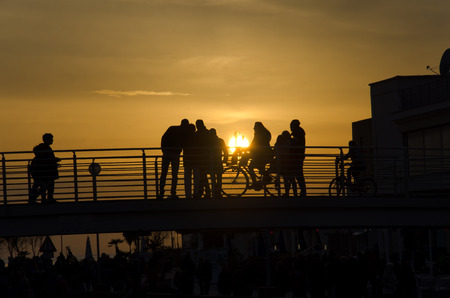 View of urban life over pedestrian bridgeの写真素材