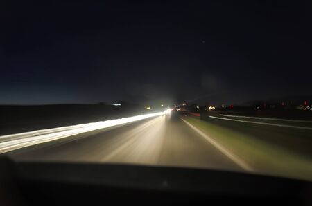 Driving the car at the night can be dangerousの写真素材
