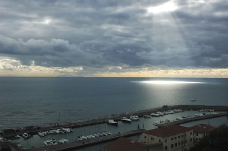 View of rays of sunshine filtering from the cloudsの写真素材