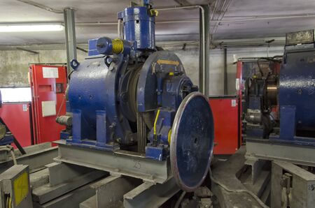 View of an old engine motor in a machine roomの写真素材