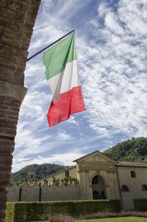 View of the Italian flag with sky in the backgroundの写真素材