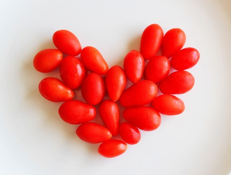 Cherry tomatoes in a heart shapeの写真素材