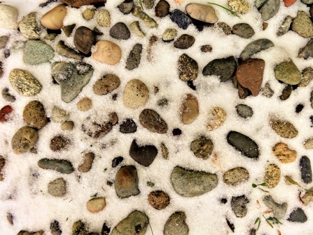 Snow on gravelの写真素材