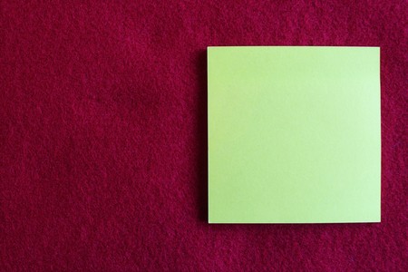 A blank note on red color background