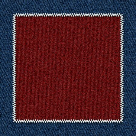 Background from a jeans fabric with a red patchの写真素材