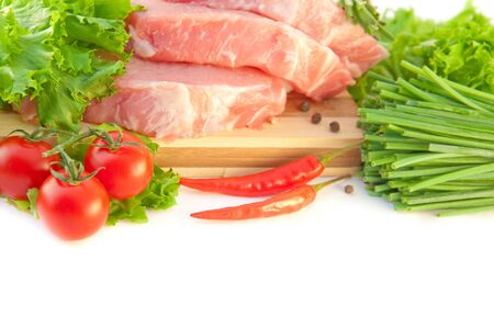 Tomatoes, an onion, pepper and meat on a white backgroundの写真素材