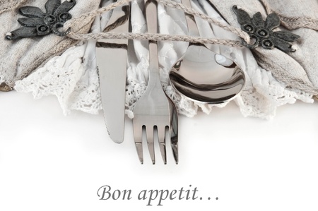 Table fork and knife in a napkin of medieval styleの写真素材