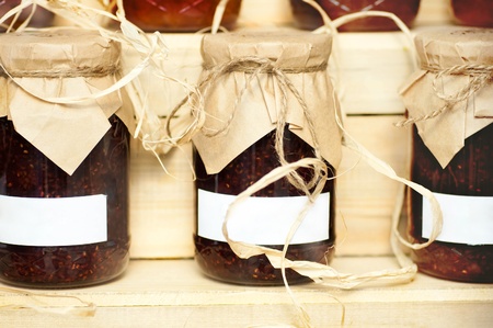 Banks with jam are covered with paper home-styleの写真素材