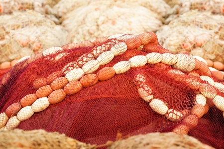 Fishing tackles in a heap ashoreの写真素材