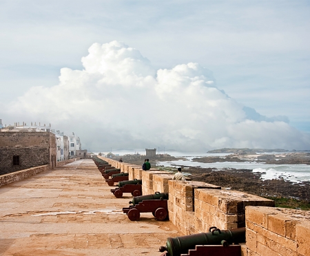 Blue fishing boats on an ocean coast in Essaouira, Moroccoのeditorial素材