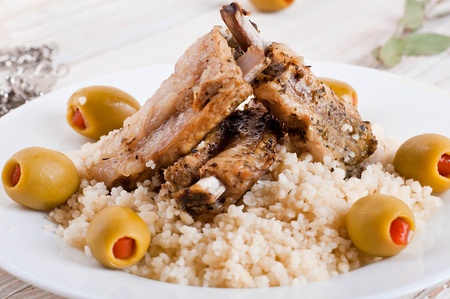 Moroccan tagine with lamb ribs, couscous and olivesの写真素材