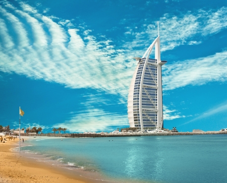 DUBAI - JUNE 4:  Burzh al Arab is well-known hotel on June 4, 2013 in Dubai. The hotel was constructed in the form of Dow's sail, the Arab vessel. Closer to top there is a helipad. One of the main sights of Dubaiのeditorial素材