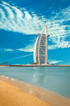 DUBAI - JUNE 4:  Burzh al Arab is well-known hotel on June 4, 2013 in Dubai. The hotel was constructed in the form of Dow's sail, the Arab vessel. Closer to top there is a helipad. One of the main sights of Dubaiのeditorial素材
