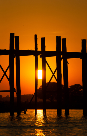 
Bridge U-Bein teak bridge is the longest. Sunset with silhouettes of people unrecognizableの写真素材
