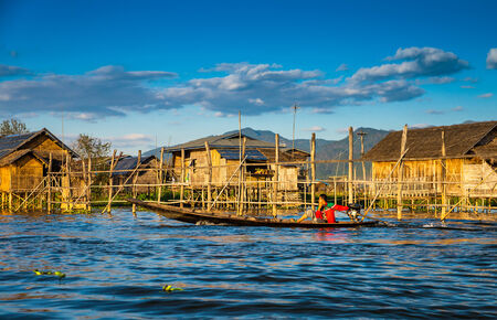 Mandalay - December 5: Fishermen catch fish December 5, 2013 in Inle Lake. Fishermen show ancient way of fishing netsのeditorial素材