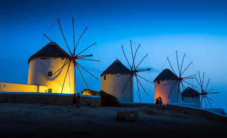 Mills on the Greek island in the sunsetの写真素材