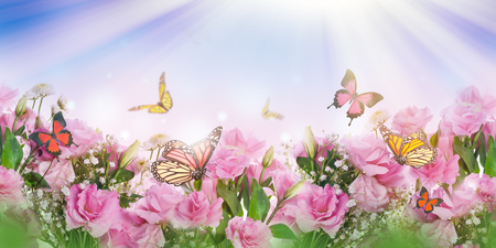 A bouquet of delicate pink roses, summer flowers. Floral background. Eustoma.の写真素材