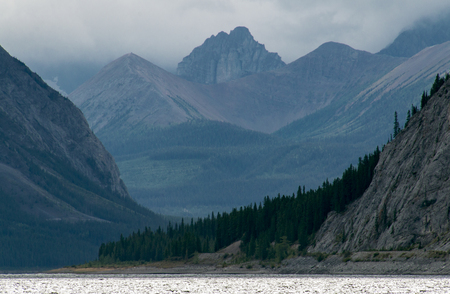 Mountains visible through the mist in Kananaskis country.の写真素材