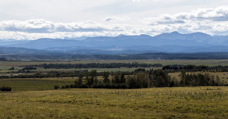 A view of the Canadian Rockies from miles away.の写真素材