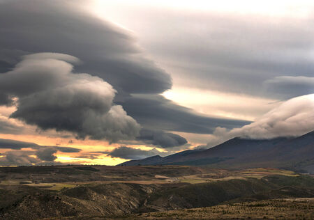 Landscape mountain and clouds at sunsetの写真素材