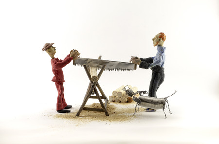 two man chopping wood on white backgroundの写真素材