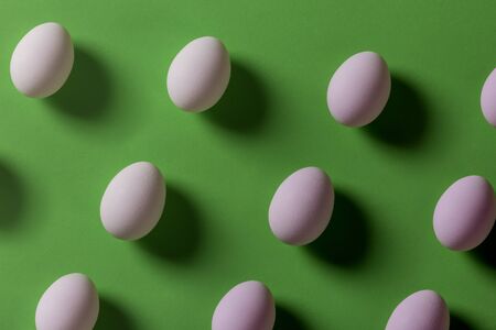 Pattern of white eggs on green backgroundの写真素材