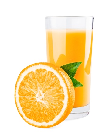 Glass of orange juice and orange half with leaves isolated on white backgroundの写真素材