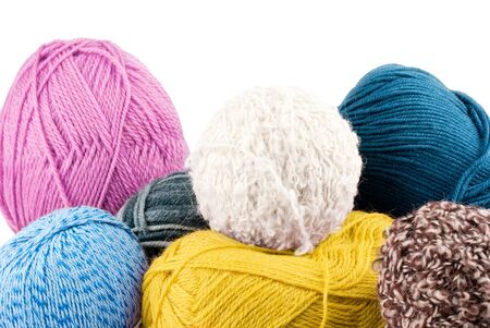 Balls of yarn on white background